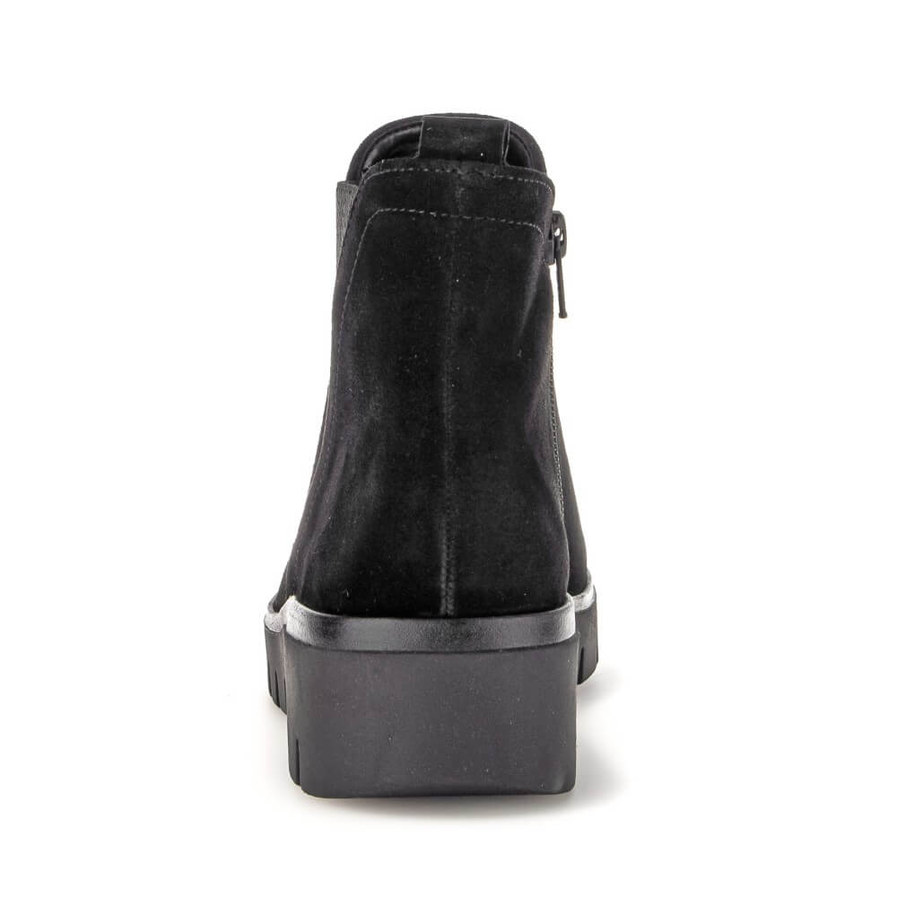 Black ankle boot with a zipper on a white background Gabor Dublin 72.061 Suede Ankle Boots combine classic Chelsea