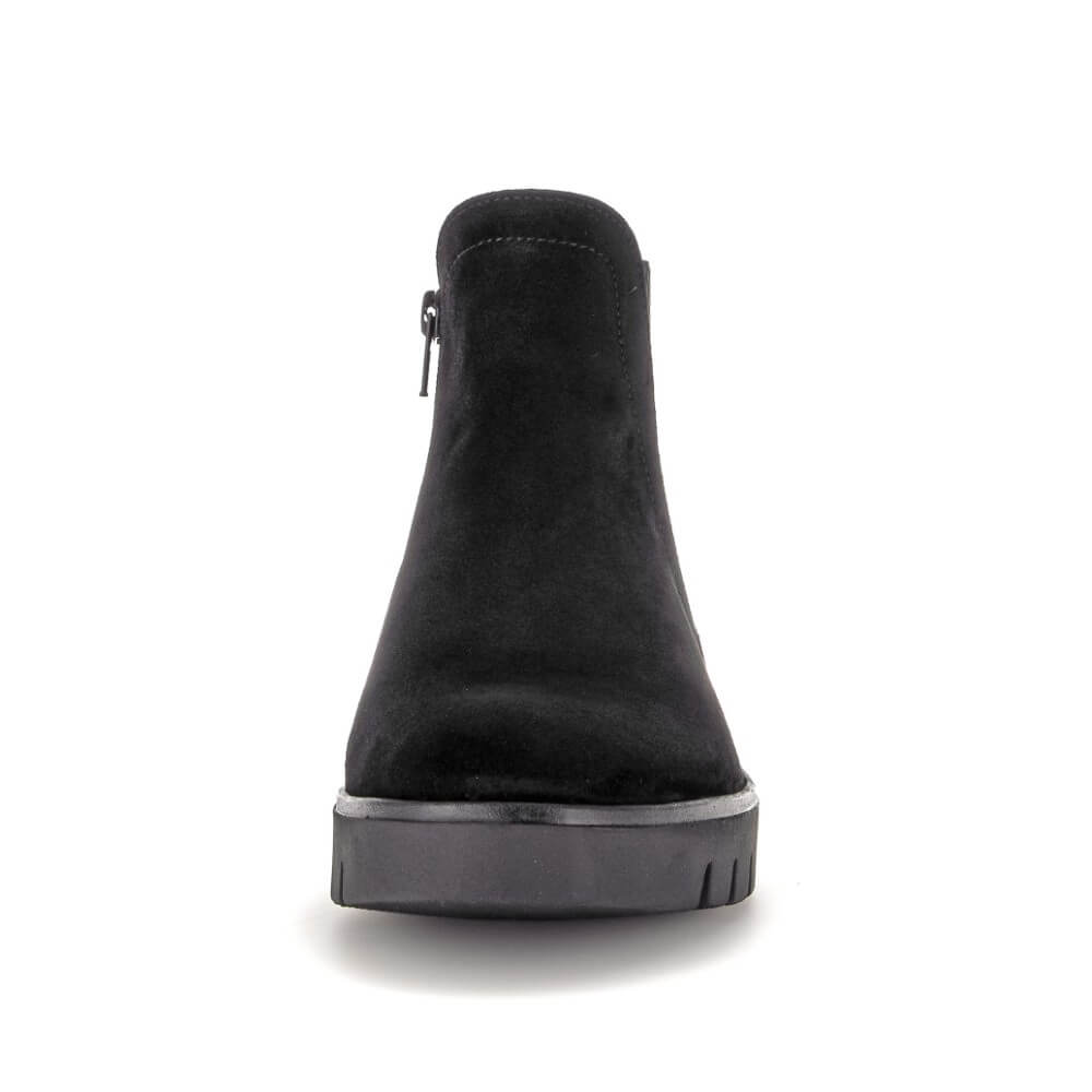 Black ankle boot with a zipper on a white background Gabor Dublin 72.061 Suede Ankle Boots combine classic Chelsea