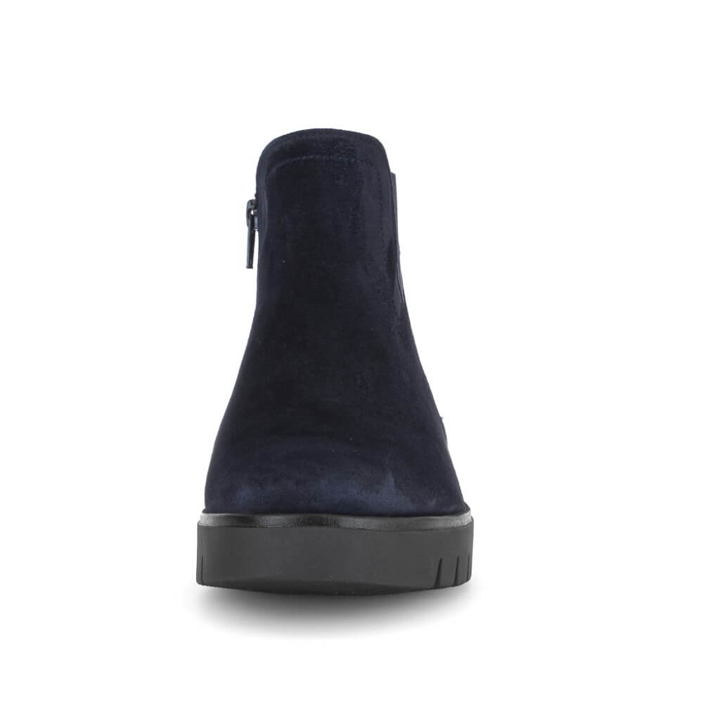 Navy blue ankle boot with a black sole on a white background Gabor Dublin 72.061 Suede Ankle Boots combine classic Chelsea