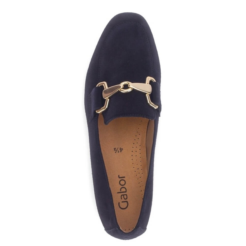 Navy loafer with gold buckle on a white background