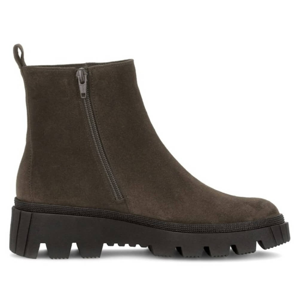 Brown ankle boot with a zipper on a white background