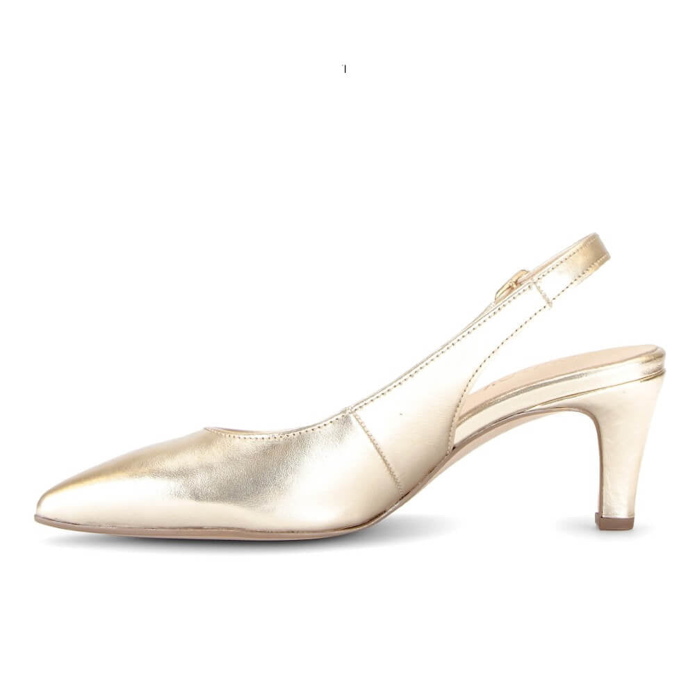 Gold high-heeled shoe on a white background