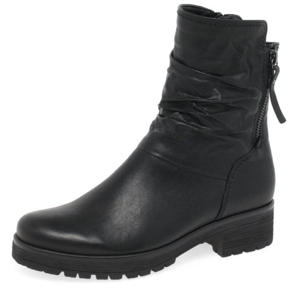 Black leather ankle boot on a white background