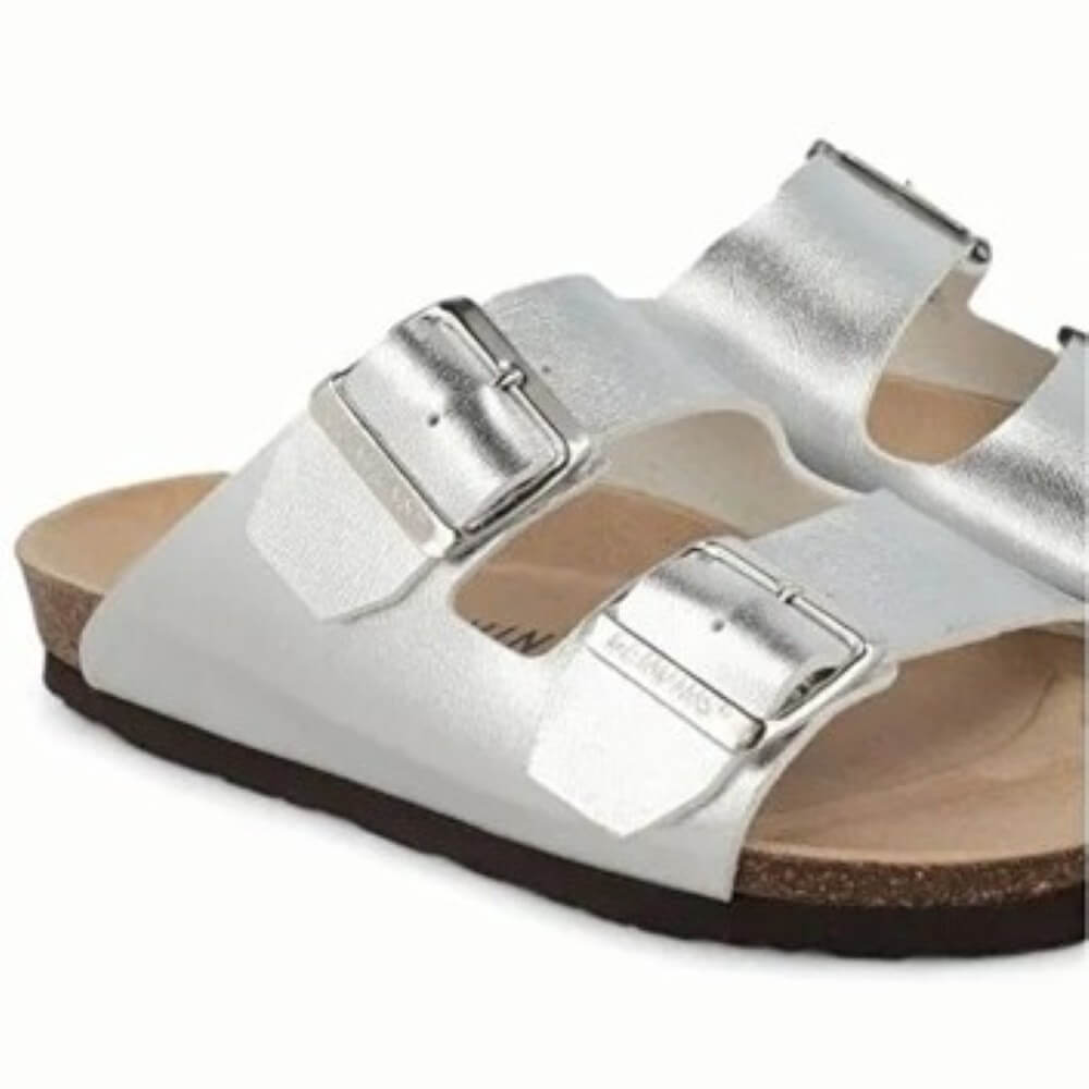 Silver sandal with double buckle on a white background