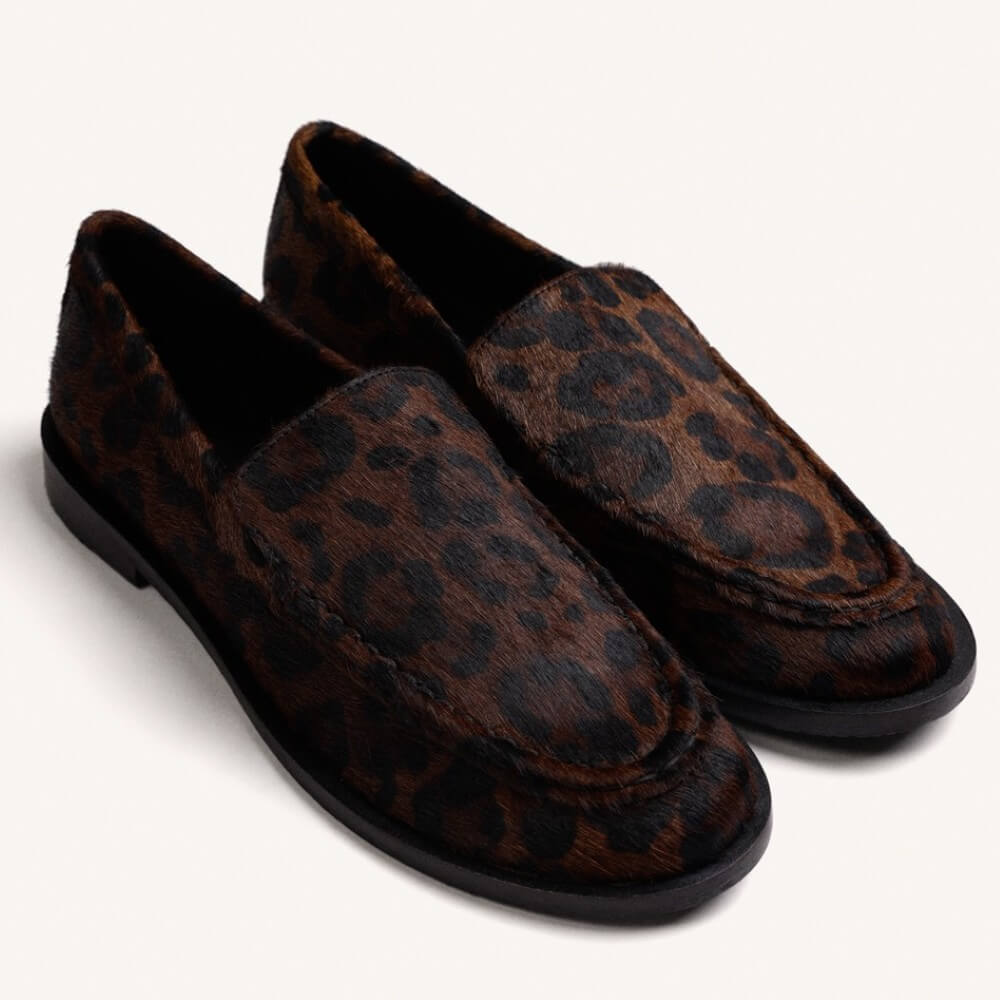 A pair of Gioseppo brown and black leopard-print loafer shown in a side profile view against a plain off-white background.
