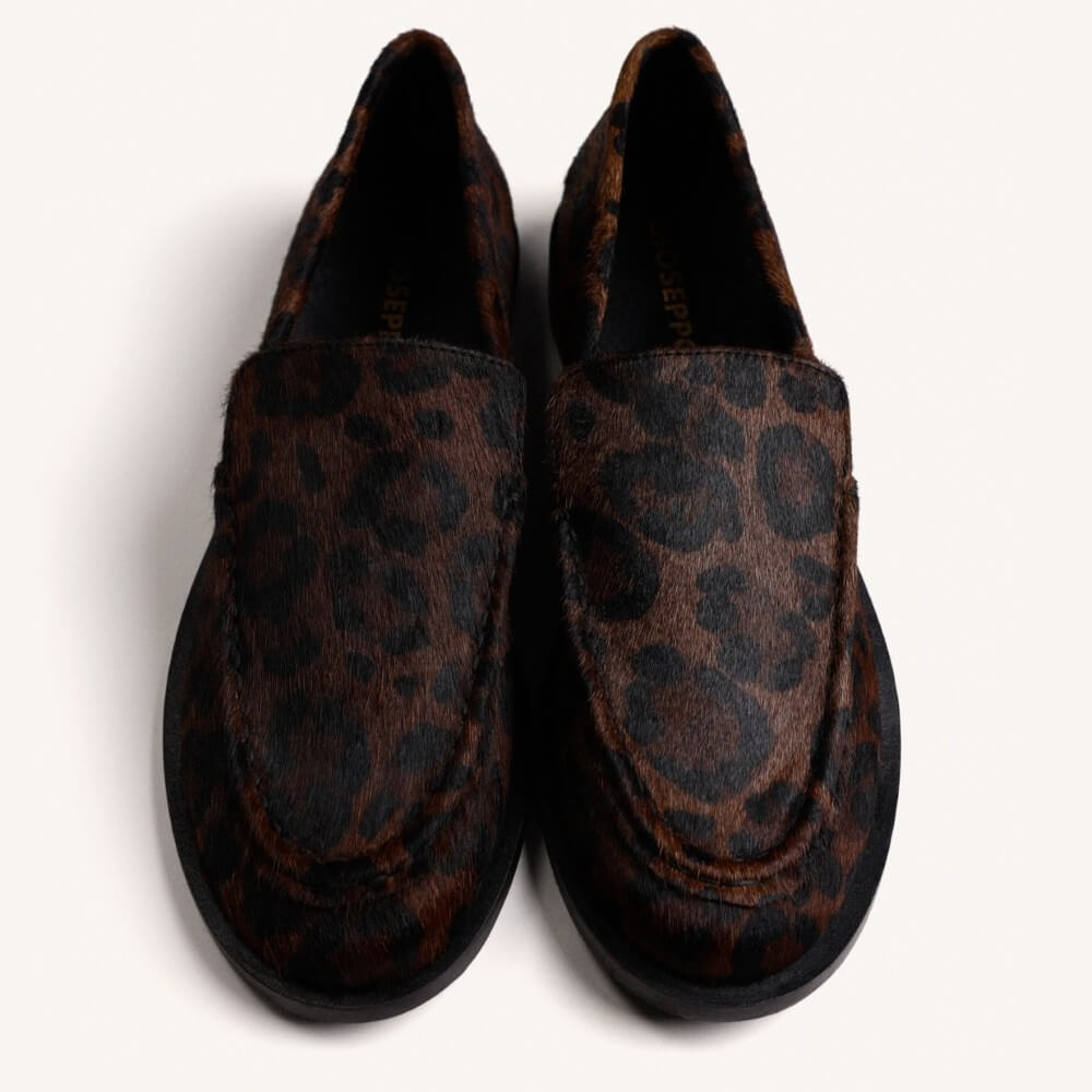 A Gioseppo brown and black leopard-print loafer shown in a top down profile view against a plain off-white background.