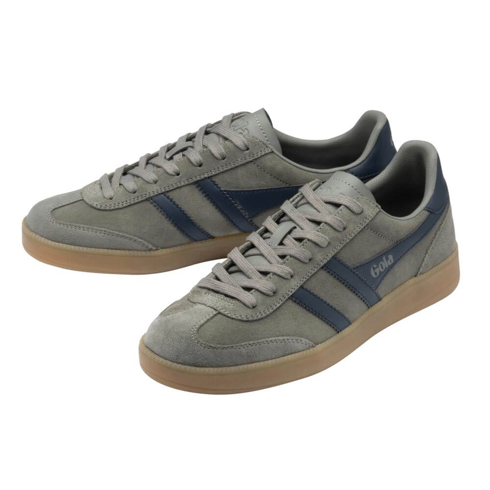 A pair of low-top suede sneakers in gray and navy blue with gum soles, shown on a plain white background.