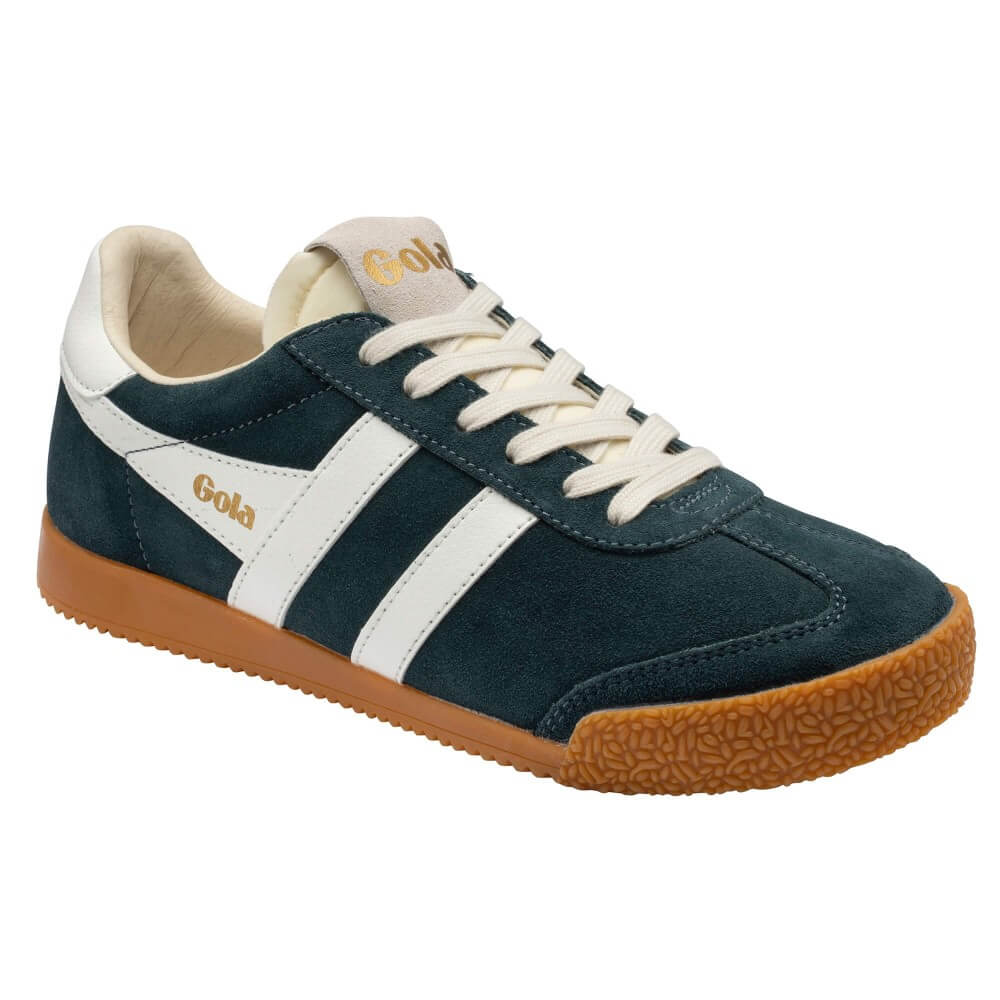 A Gola low-top sneaker in Teal suede with white side stripes, cream laces and collar, and a brown gum sole. The brand name 'Gola' is printed in gold on the side, tongue, and heel.