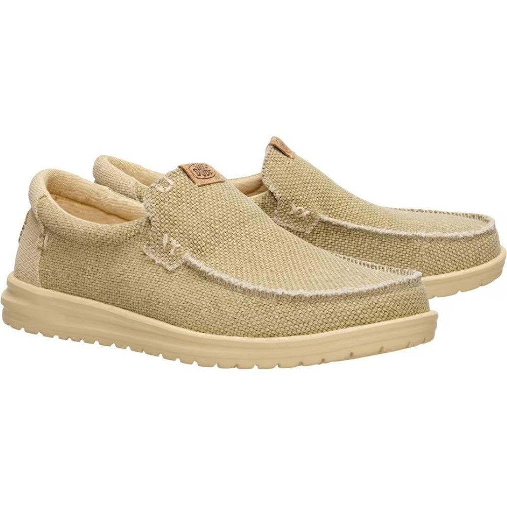 HeyDude Beige slip-on shoes on a white background