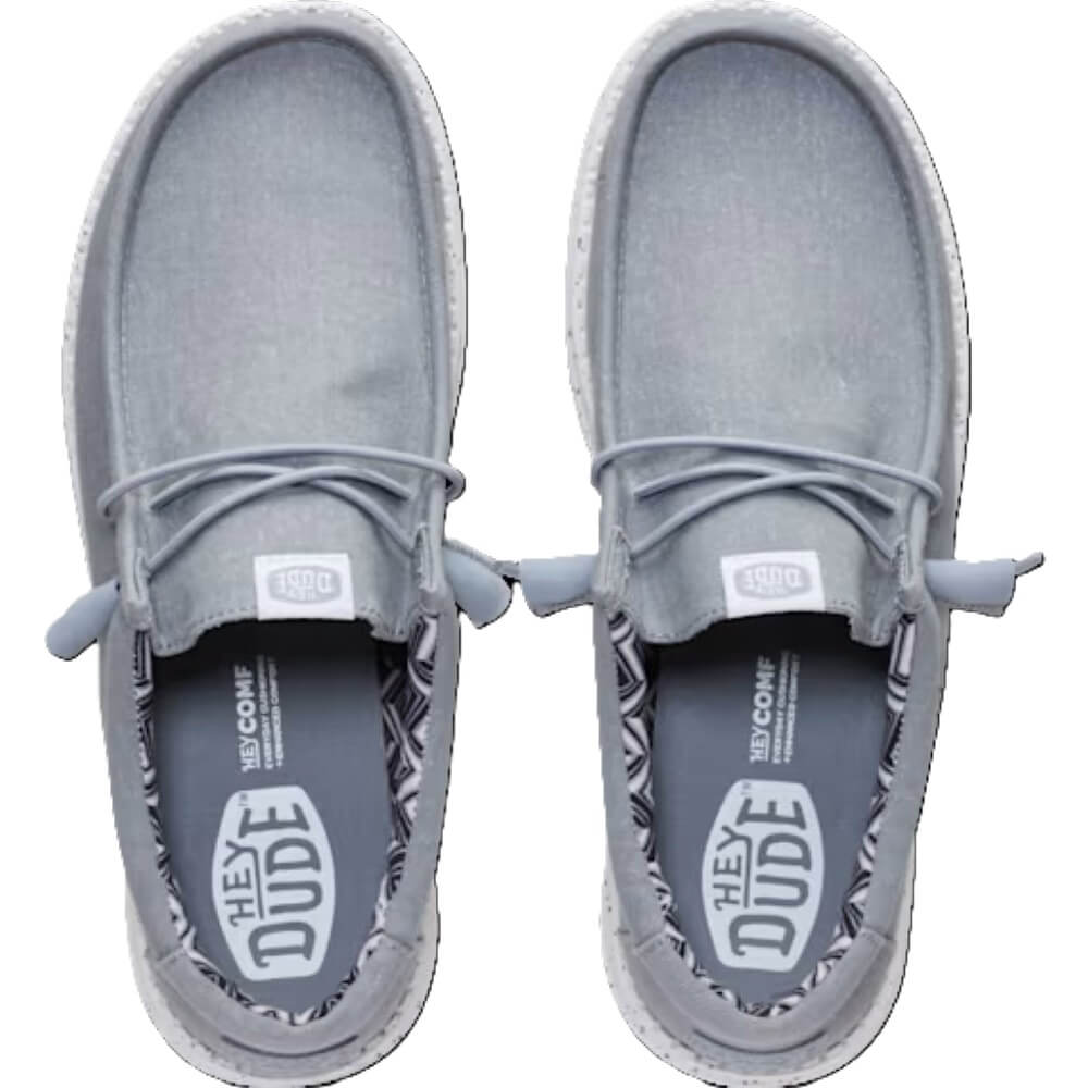 Gray casual shoes with 'Hey Dude' branding on a white background
