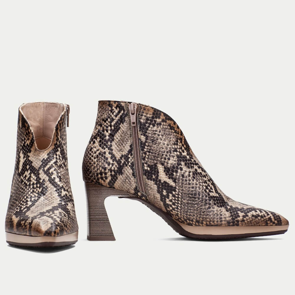 Snake print ankle boot on a light gray background Hispanitas Atlanta HI254270 Leather Ankle Boot Anaconda Snake Print
