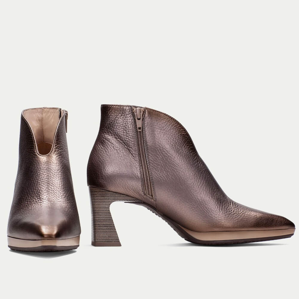 Brown leather ankle boot with a block heel on a light gray background Hispanitas Atlanta HI254270 ankle boot features Metallic Taupe leather with a pointed toe