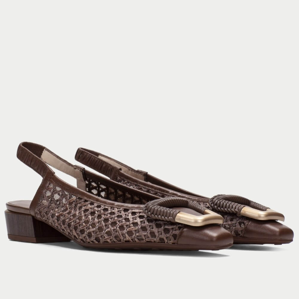 Pair of Hispanitas brown slingback shoes with gold accents on a white background