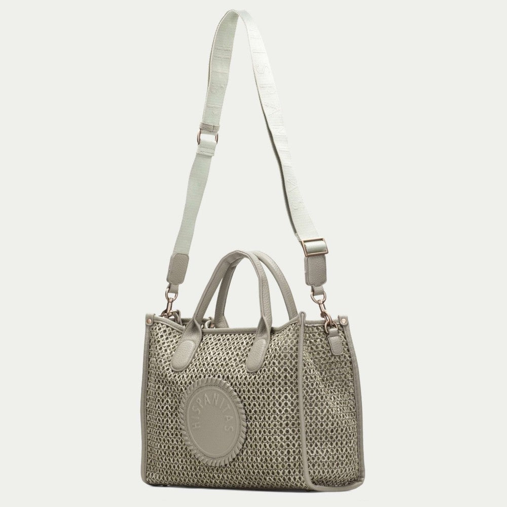 Hispanitas green textured handbag with brand logo on a light grey background
