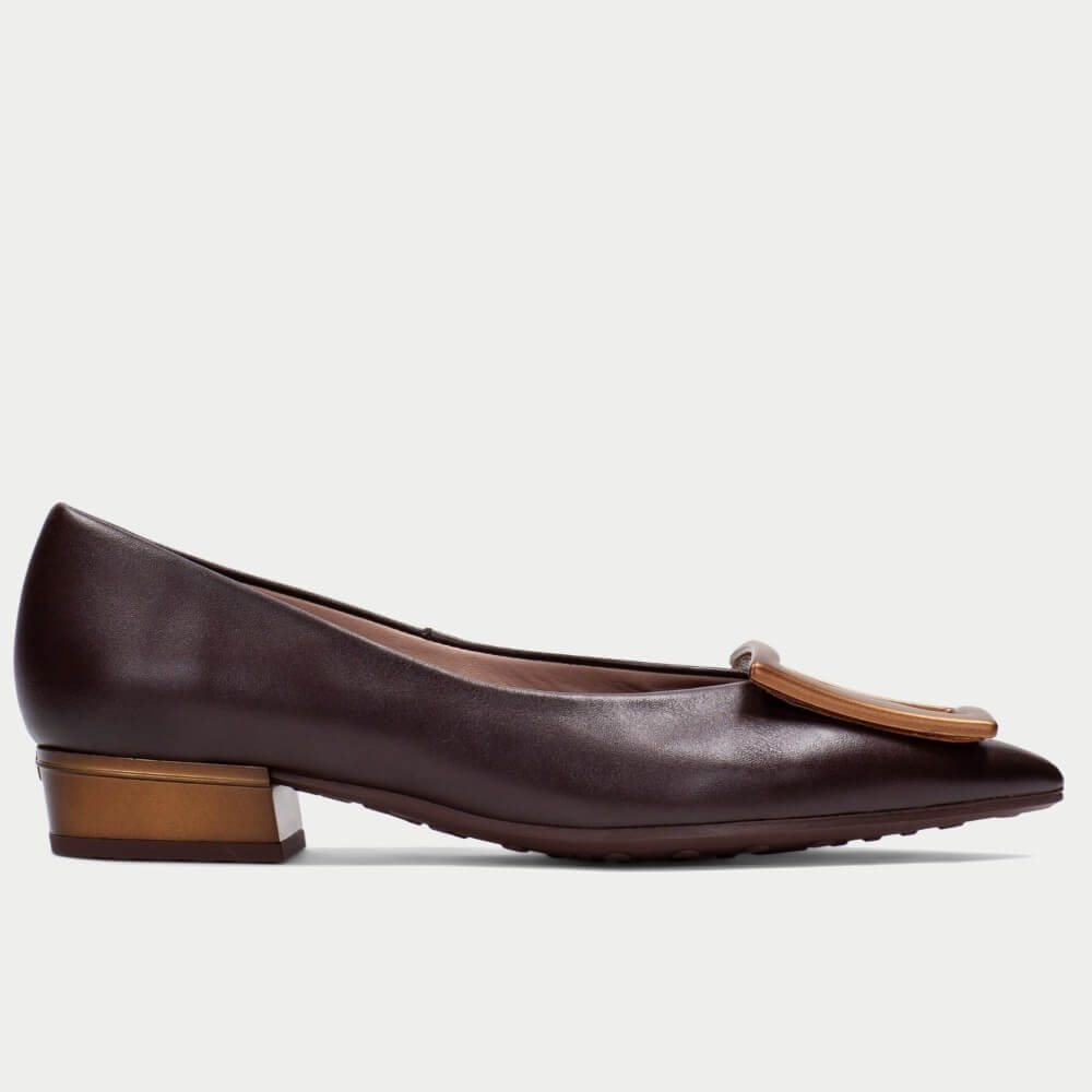 Hispanitas dark brown leather low-heel pump shoe with a tan leather decorative accent on the toe, shown in a side profile against a light grey background.