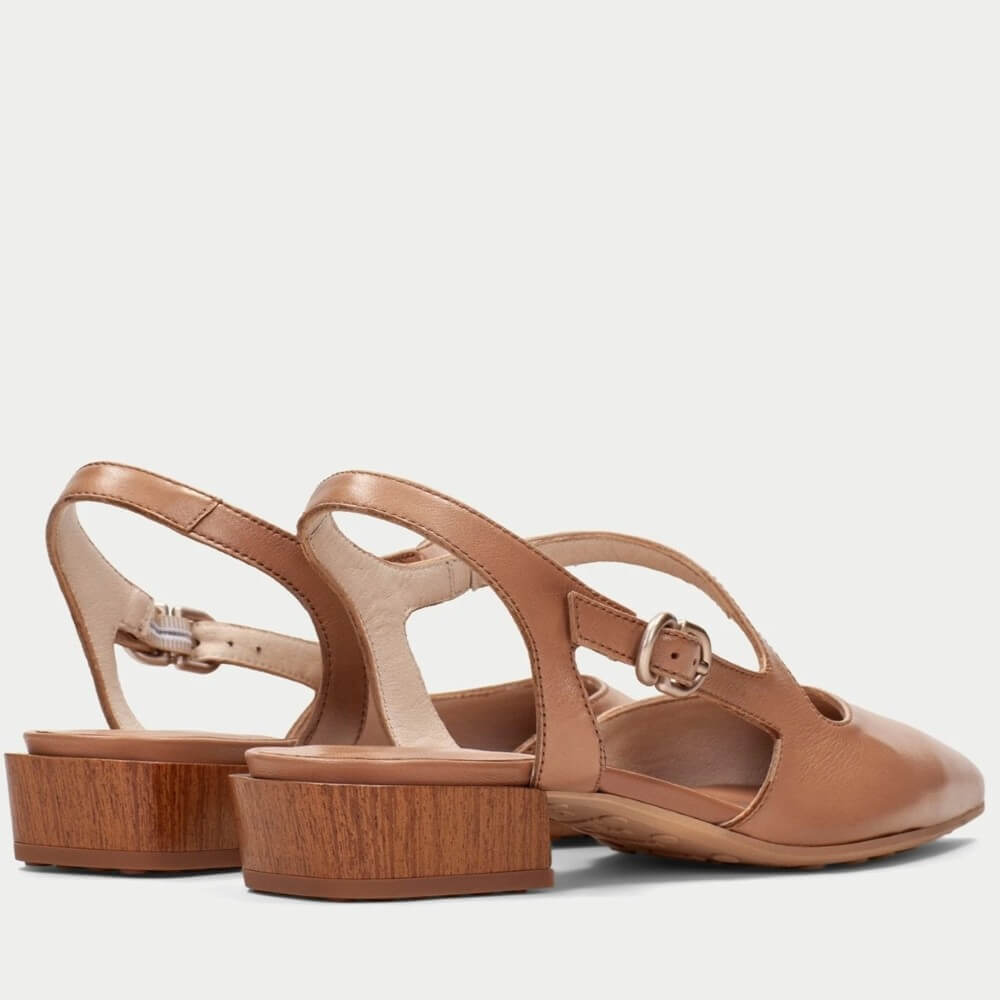 Hispanitas HV264773 Tan low-heeled shoe with a slingback design on a light gray background