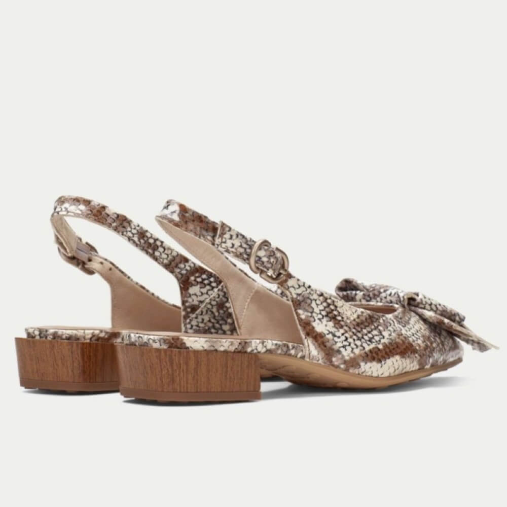 Hispanitas Snake print slingback shoe with wooden heel on a white background