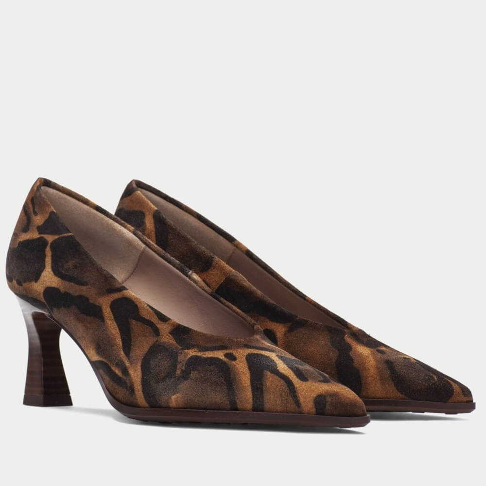 A pair of Hispanitas pointed-toe pumps with a brown and black leopard print pattern and dark brown block heels, shown on a light grey background.