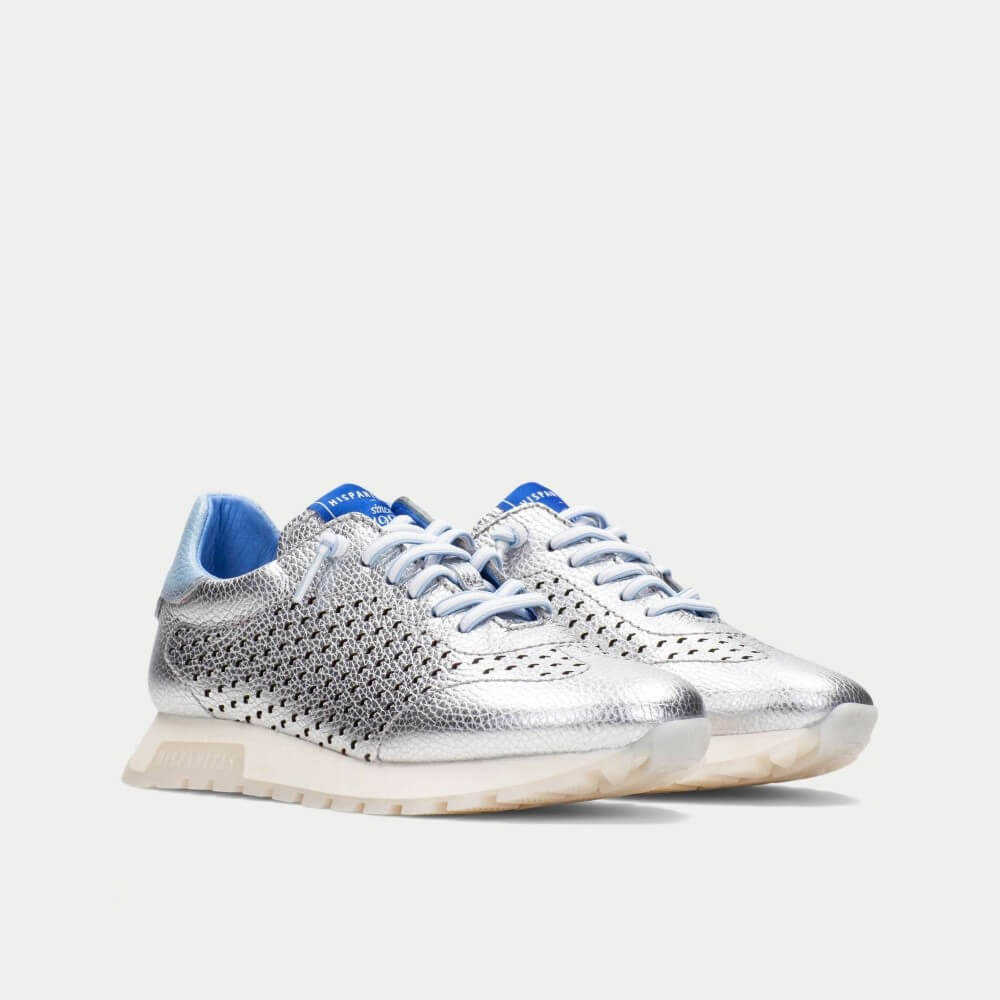 Silver sneakers with blue accents on a white background