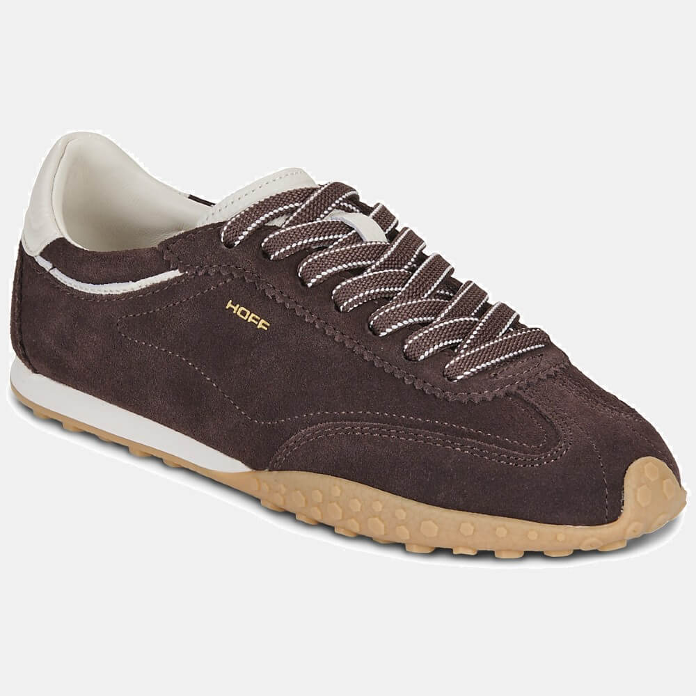 A Hoff dark brown suede sneaker with white laces, a white collar, and a tan rubber outsole, shown on a light gray background. The brand name 'HOFF' is printed in gold on the side.