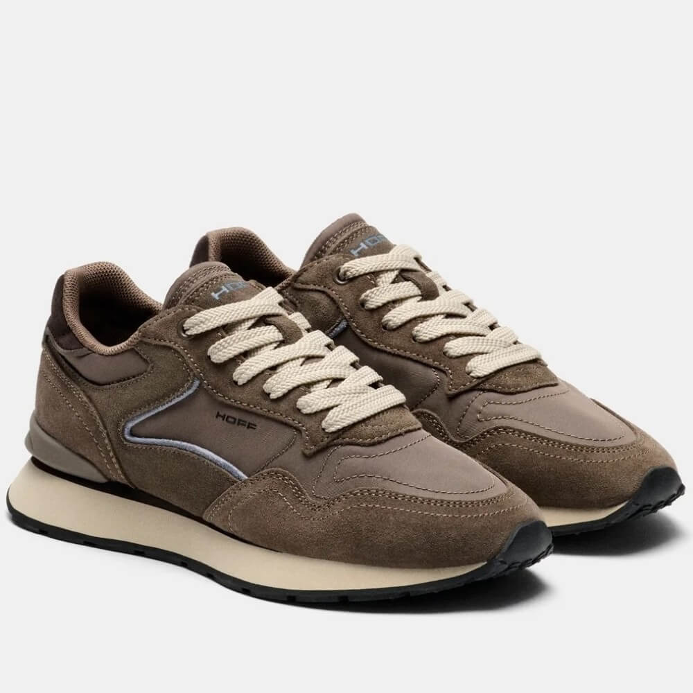 A pair of Hoff brown suede and leather sneakers with beige laces and a beige midsole, shown from a three-quarters angle on a light grey background.