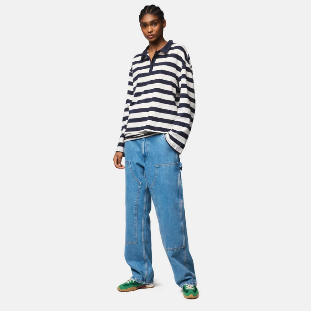 Person wearing green sneakers, a striped shirt and blue jeans on a white background Hoff Bridge MK II Green