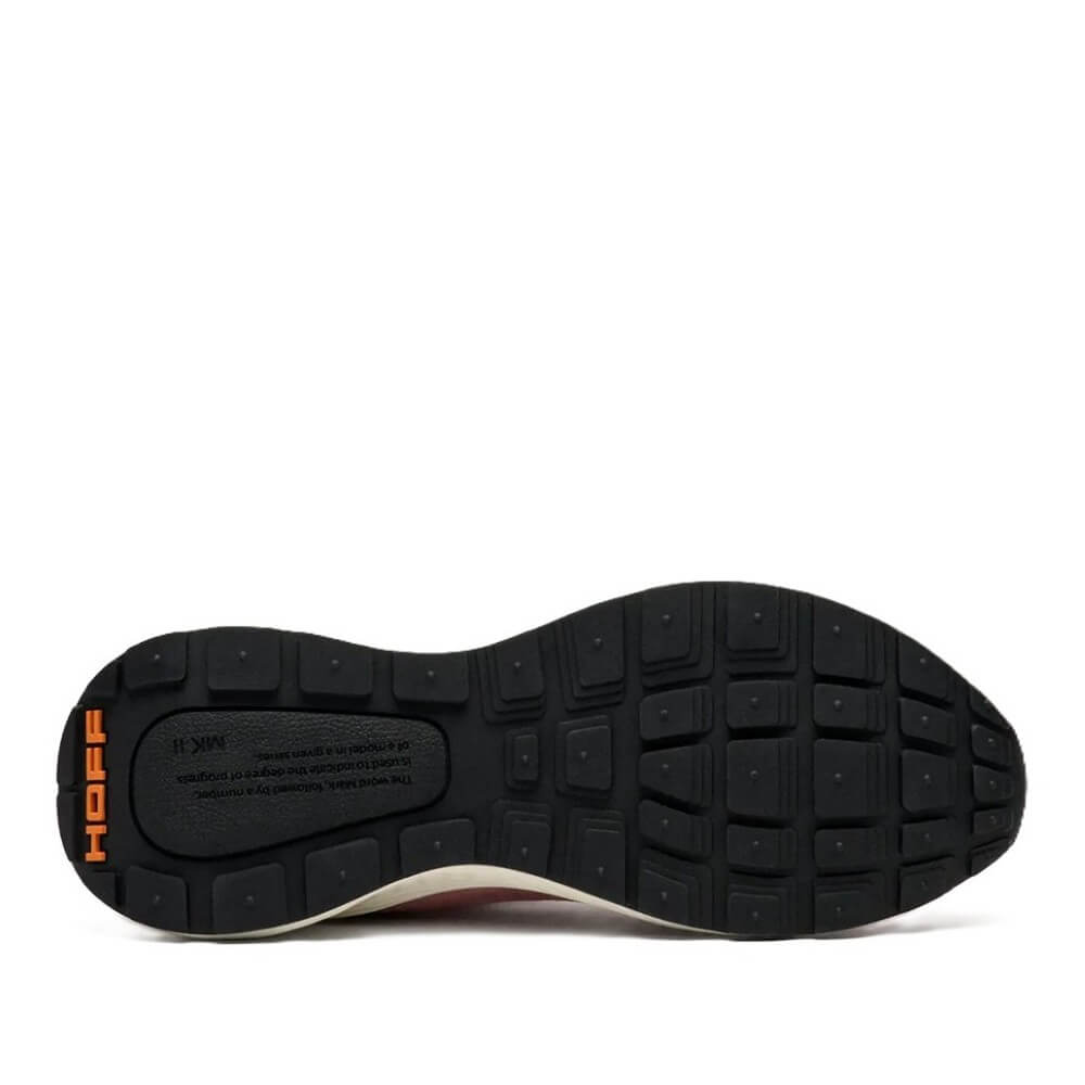 Black shoe sole with orange Hoff brand logo on a white background
