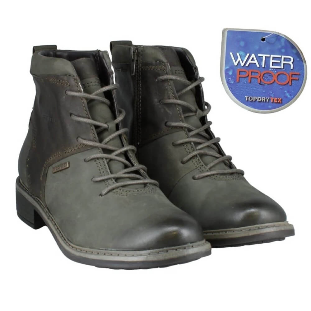 Pair of green lace-up boots with a waterproof label on a white background