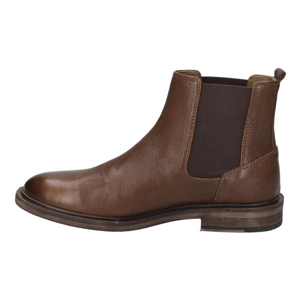 A Josef Seibel brown leather Chelsea boot with elastic side gore panels, shown in a side profile view against a plain white background.