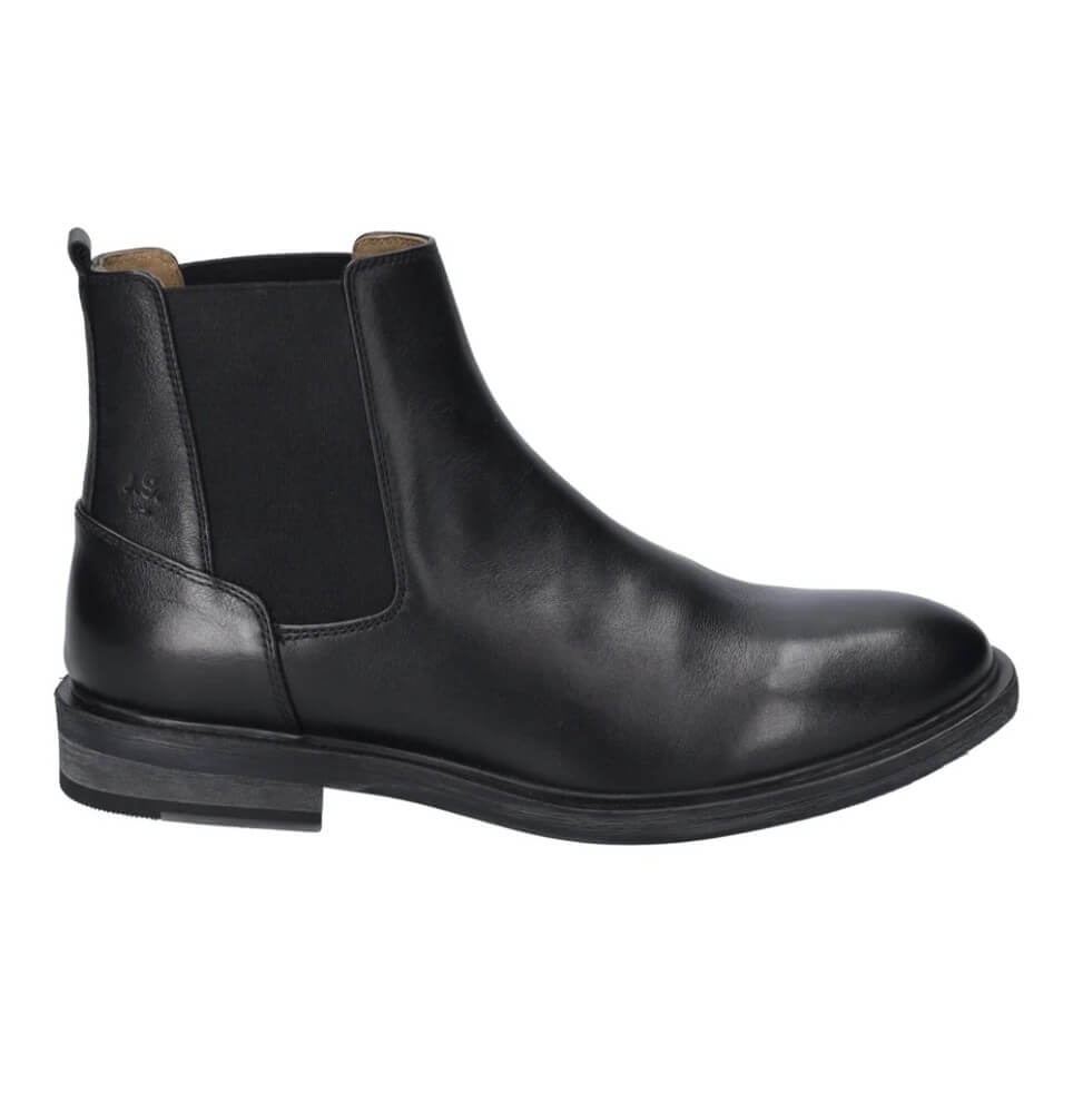 A Josef Seibel black leather Chelsea boot with a black elastic side panel, shown in a side profile view against a plain white background.