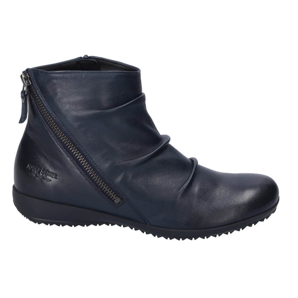 A Josef Seibel Navy leather ankle boot with chunky lug soles and a block heel, shown on a plain white background.