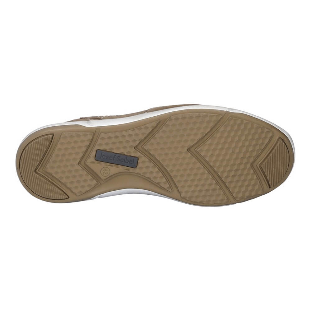 Close-up of a shoe sole with a brand logo on a white background