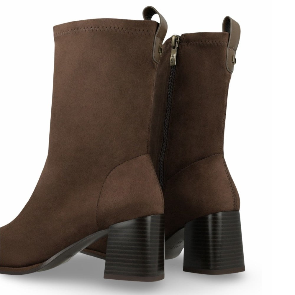 A pair of Lodi dark brown suede ankle boots with a block heel and side zipper, shown from a three-quarter angle on a white background.