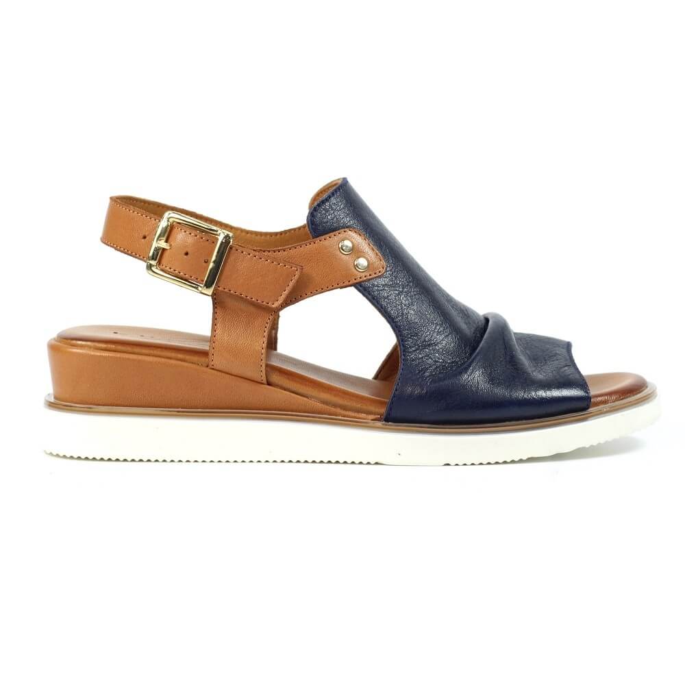Lunar Navy sandal with brown straps on a white background