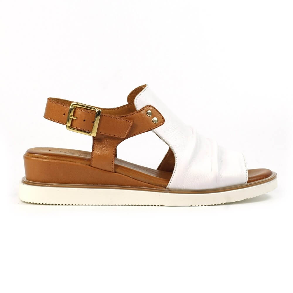 Lunar White sandal with brown straps and sole on a white background