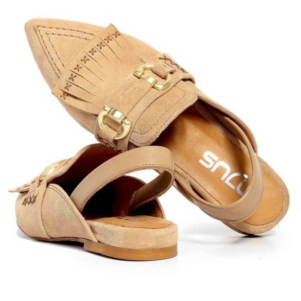 MJUS Tan suede shoes with gold buckle and tassel on a white background