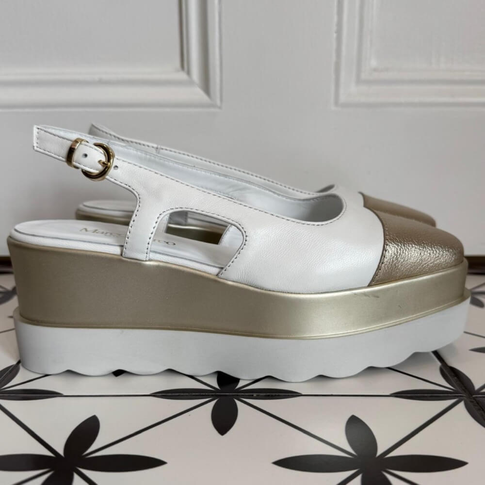 Marco Moreo White and Gold Platform Slingbacks Beth Vienna X722 on a black and white patterned floor