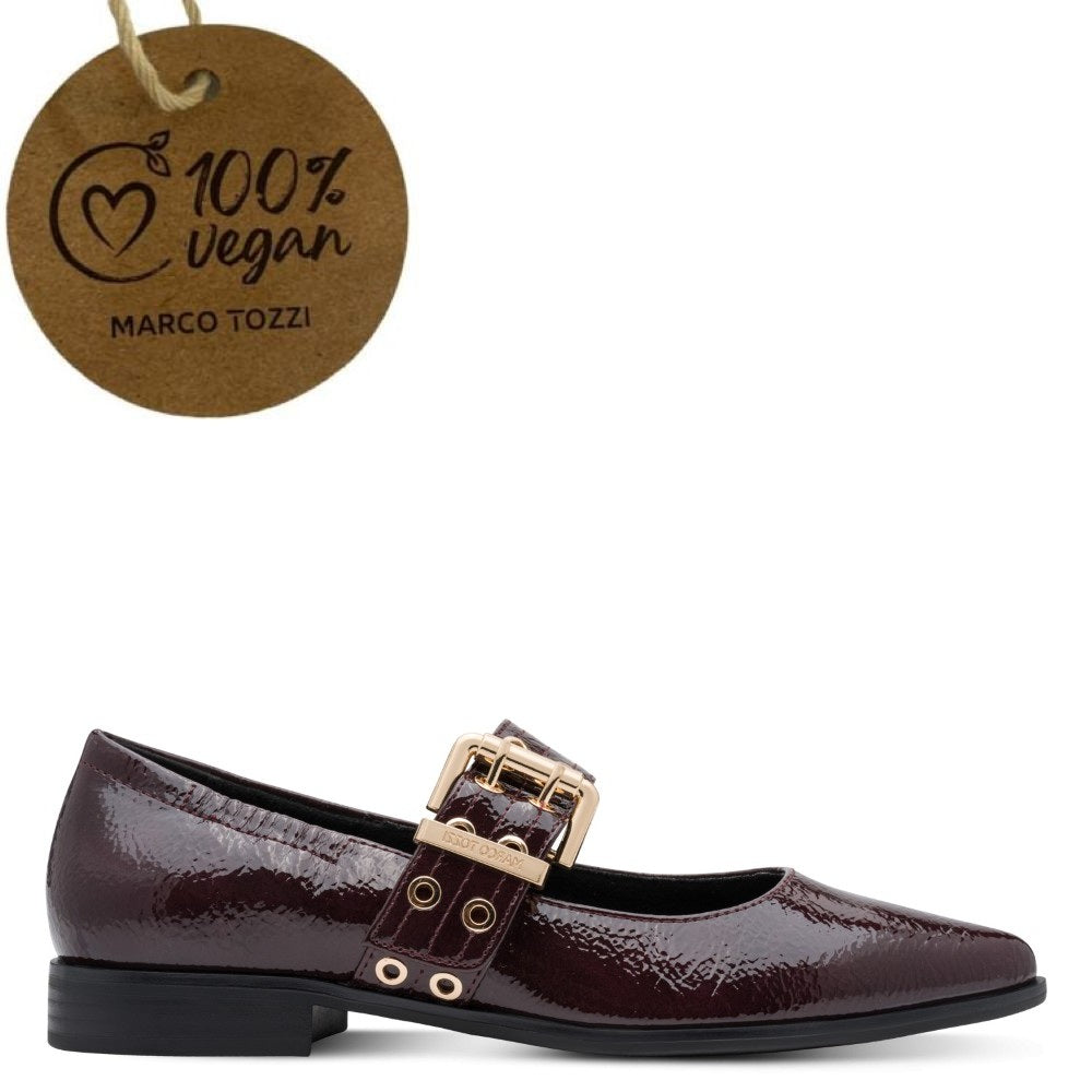 Marco Tozzi wine patent leather shoe with gold buckle and '100% Vegan' tag on a white background