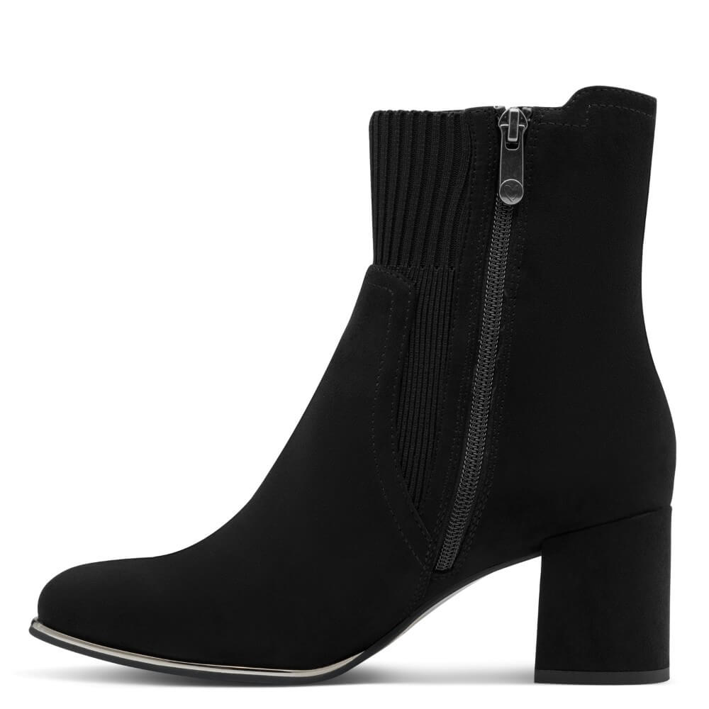 A black suede ankle boot with a ribbed knit side panel and a silver-tone zipper, shown from a side profile on a white background.
