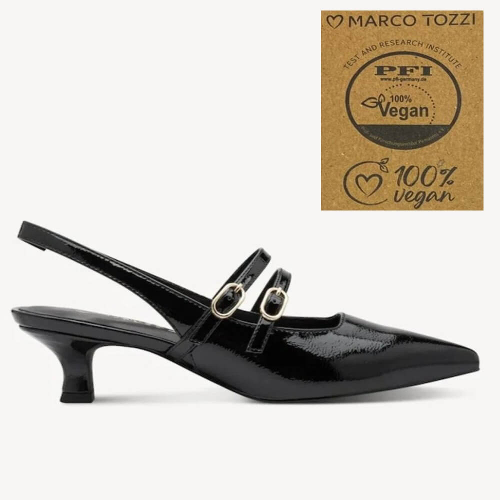 A black patent slingback kitten heel shoe with double straps and gold-tone buckles, shown in profile against a light grey background. A brown cardboard badge in the top right reads 'Marco Tozzi' and '100% Vegan' with PFI certification.
