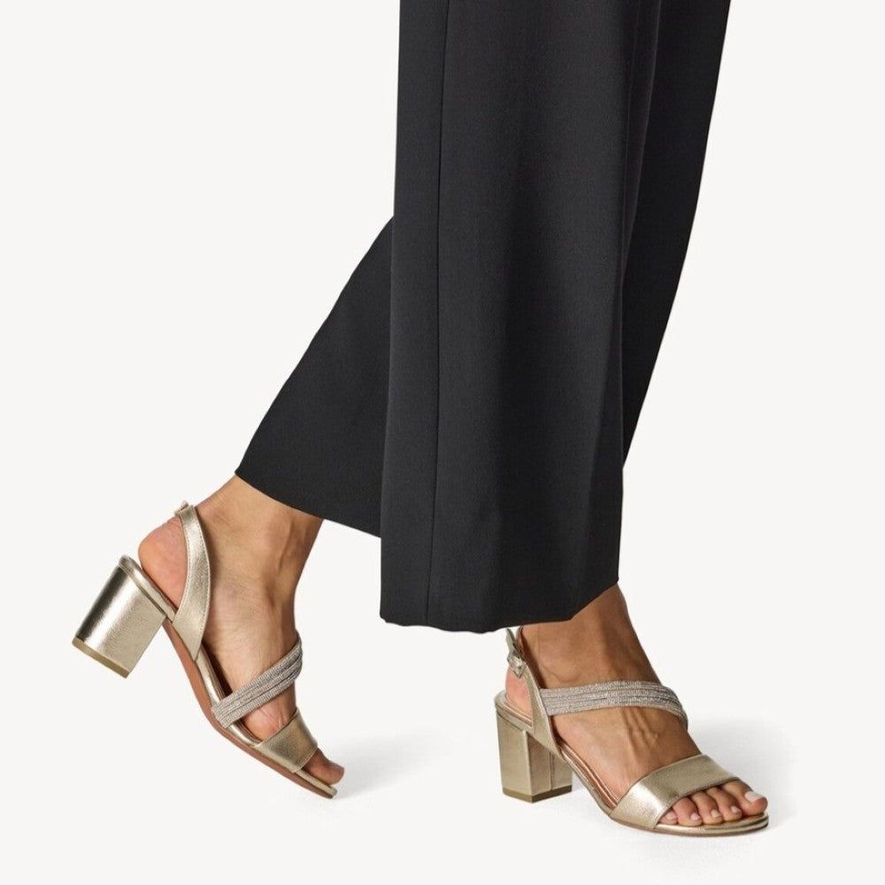 Marco Tozzi Block Heel Gold Sandals worn with black trousers