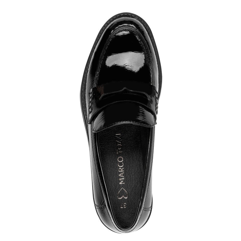 Black patent leather loafer with a '100% Vegan' label by Marco Tozzi on a white background Marco Tozzi Patent Vegan Loafer 2-24308