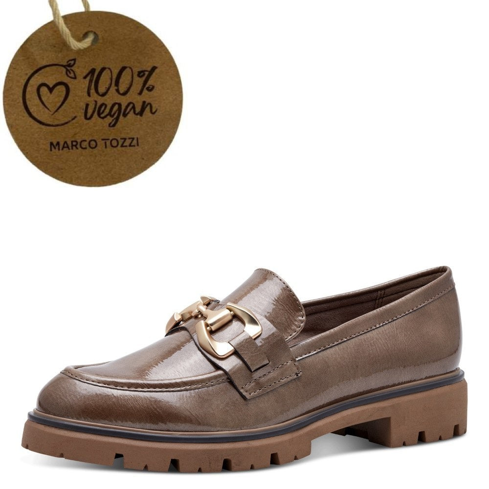 Brown loafer shoe with gold buckle and '100% Vegan' label on a white background Marco Tozzi Vegan Patent Loafer 2-24700 Taupe