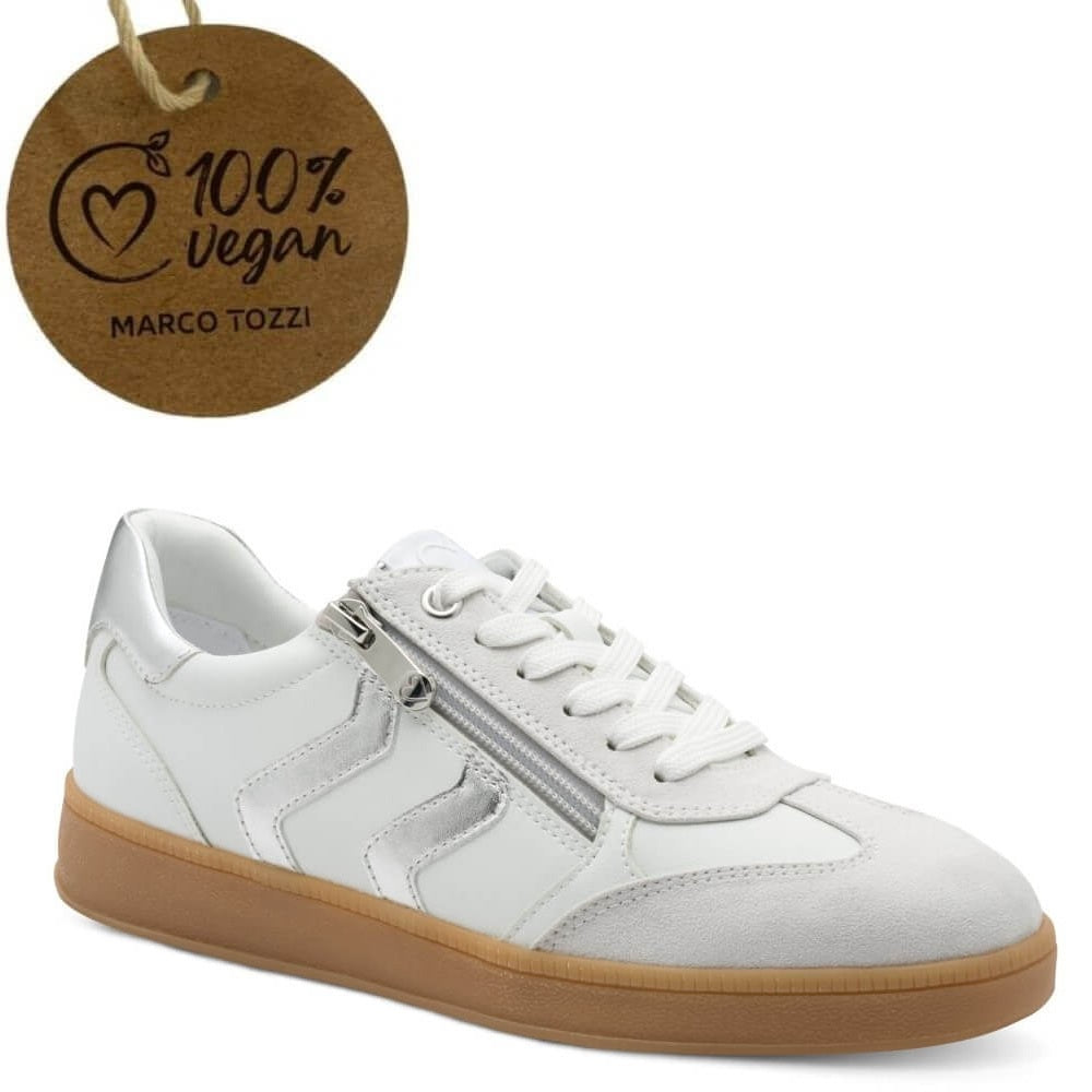 White sneaker with brown sole and '100% Vegan' label on a white background
