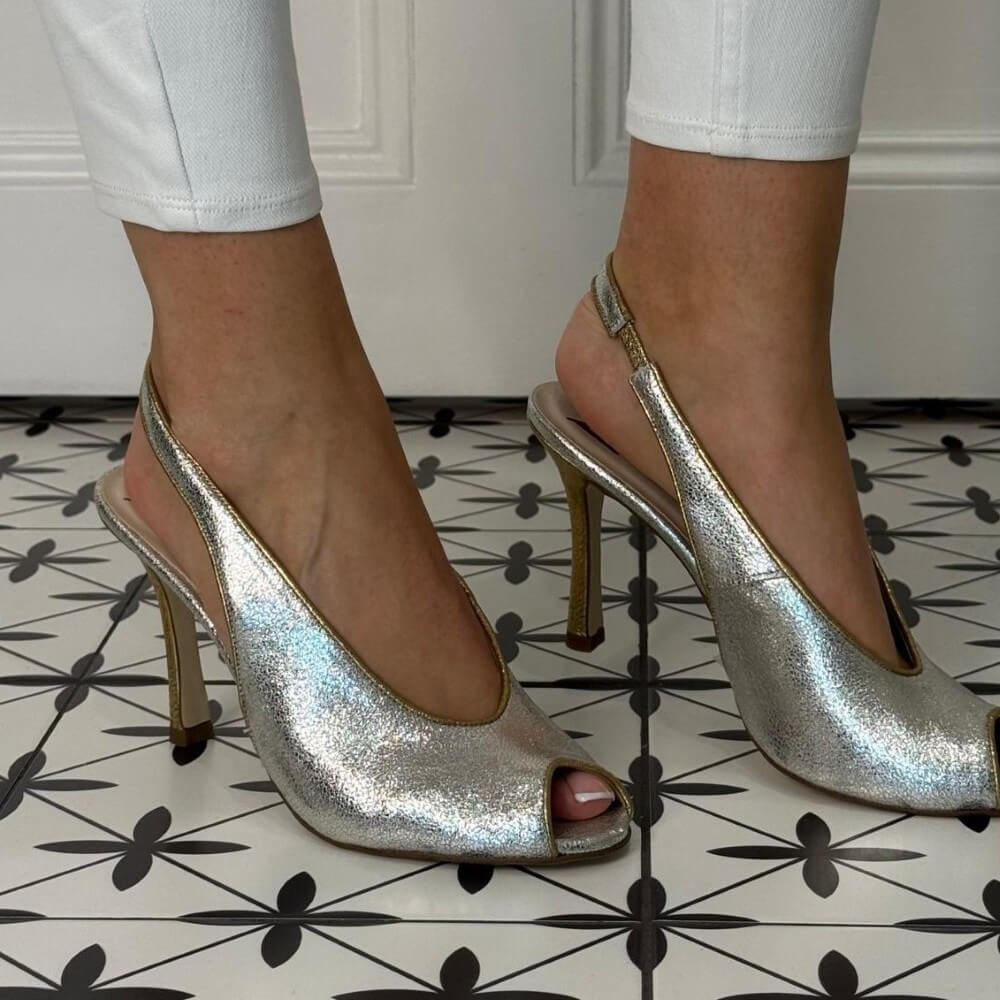 Person wearing Marian High Heel Silver Gold Peep toe slingbacks