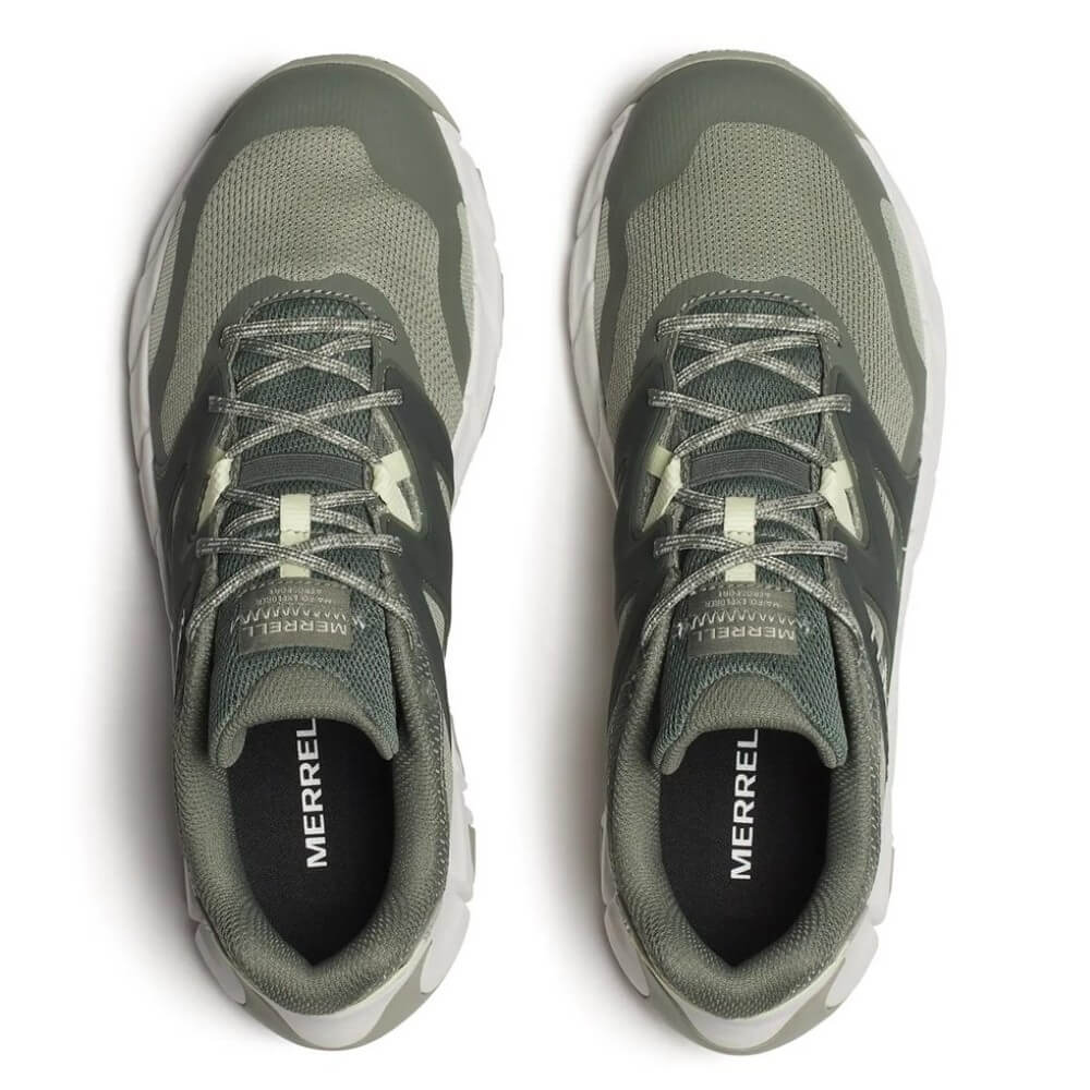 Merrell Green Walking shoes with white soles on a white background