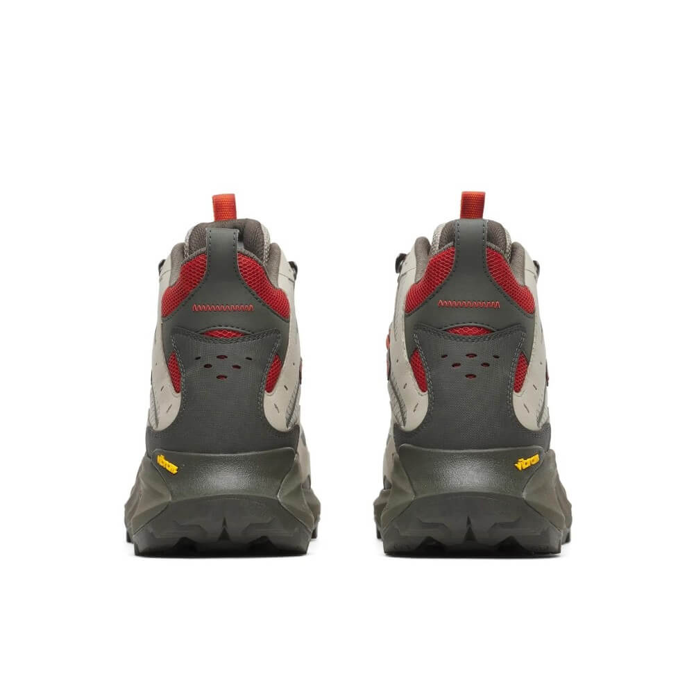 A pair of Merrell high-top hiking shoes shown from the back, featuring a dark grey and off-white leather and mesh upper with red accents, yellow Vibram logos on the midsoles, and red pull tabs on the heels, set against a plain white background.