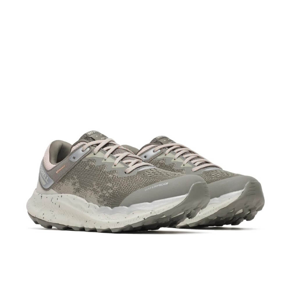 A pair of Merrell trail running shoes in a muted gray and taupe colourway, featuring a textured knit upper, matching laces, and a speckled midsole, shown against a plain white background.