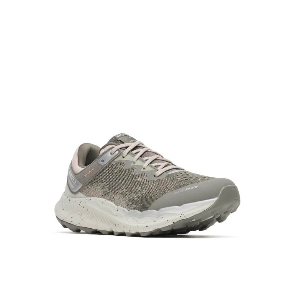 A single Merrell waterproof running shoe in a light gray and beige colourway, featuring a textured knit upper, a speckled white midsole, and a light gray outsole, shown against a plain white background.