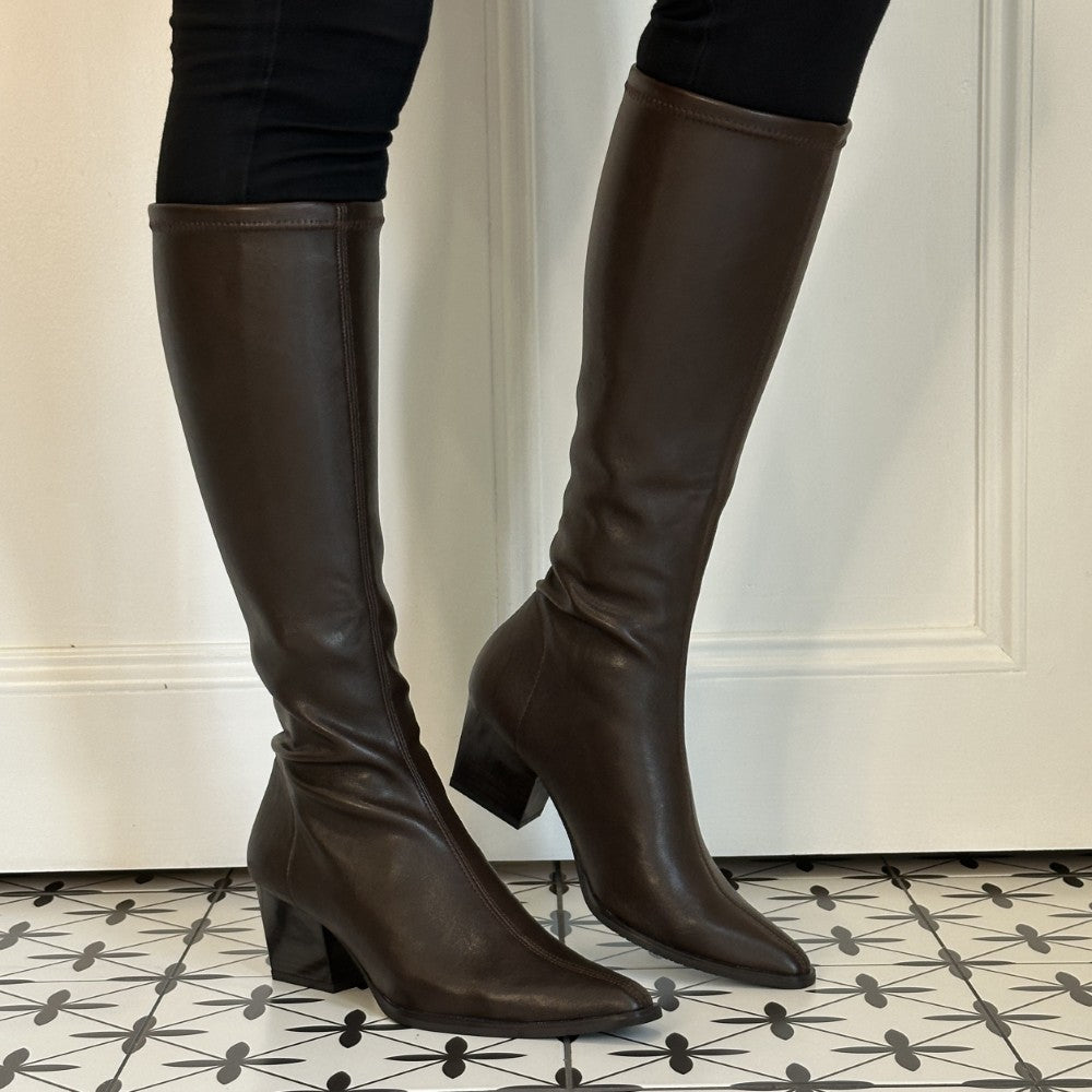 Miss Elastic 78150 Testa Brown Stretch Knee High Boot worn with black jeans an a tiled floor